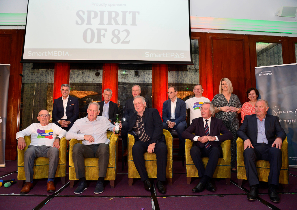 Dementia NI members Martin and Norman, Development Manager Stephanie and Empowerment Lead Ashleigh with the 1982 World Cup squad.